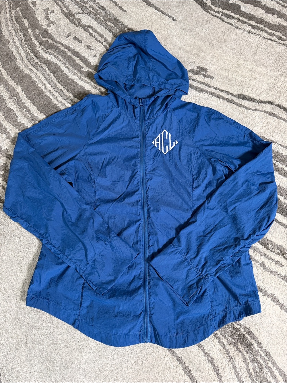 Jordann Women’s Blue Hooded Windbreaker Jacket
